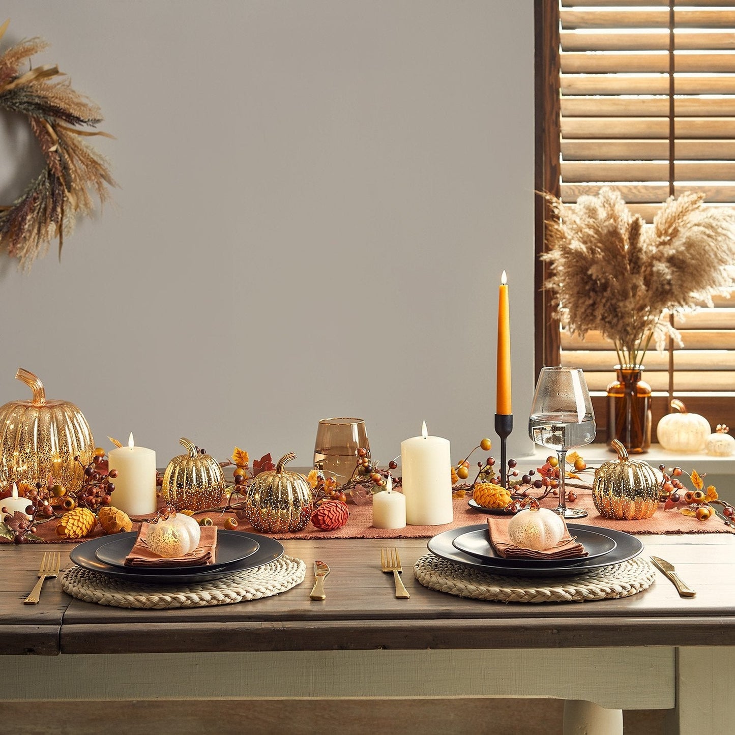 Orange-Autumn-Halloween-Dining-Table-Display-With-Pumpkins-And-Candles_1.jpg