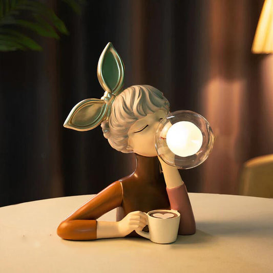 Tischlampe Figur Design aus Harz und Glas